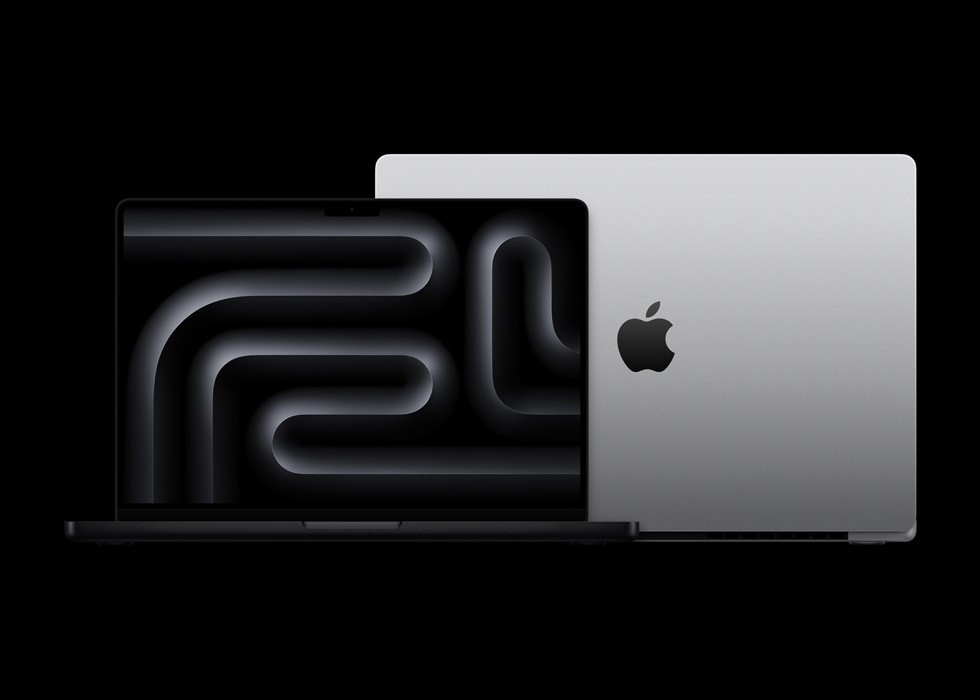 Promotional shot of the MacBook Pro M4 in Space Black, showing the Liquid Retina XDR display and lid.